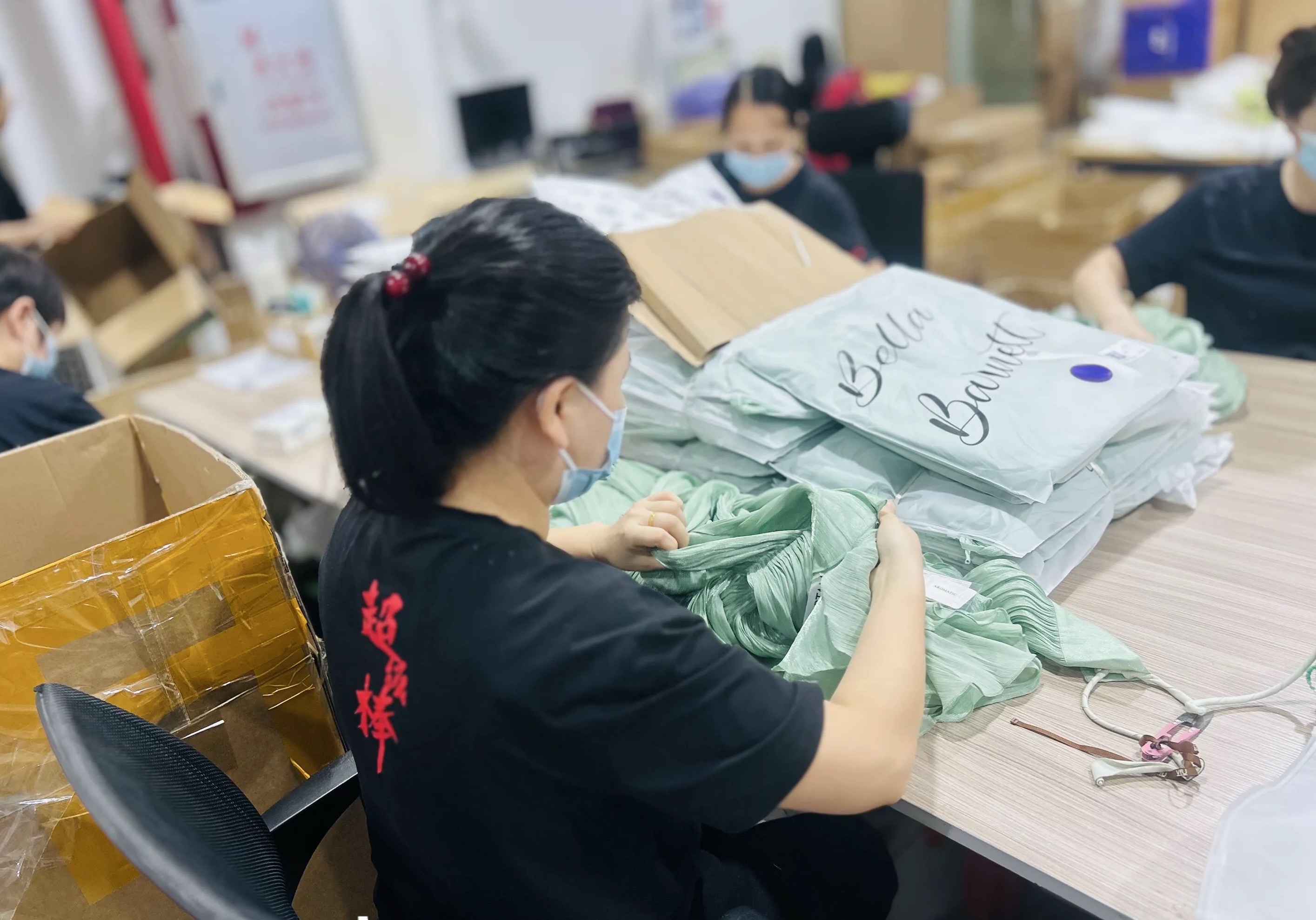 Apparel samples on factory workbench